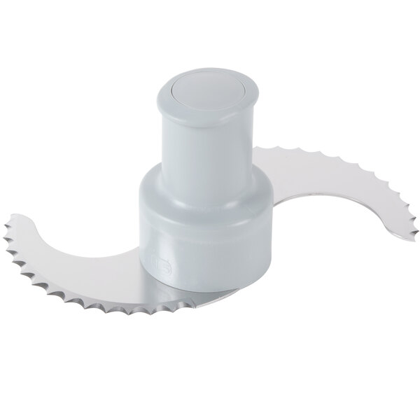 A white food processor blade with a serrated edge.