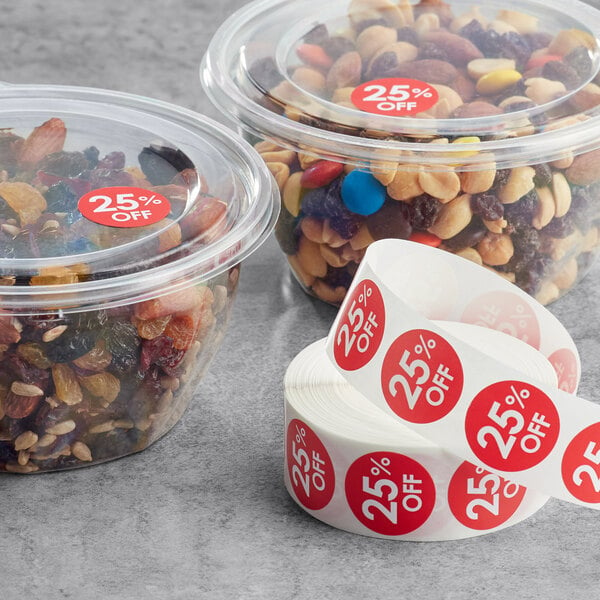 A group of plastic containers with Point Plus red labels on food.