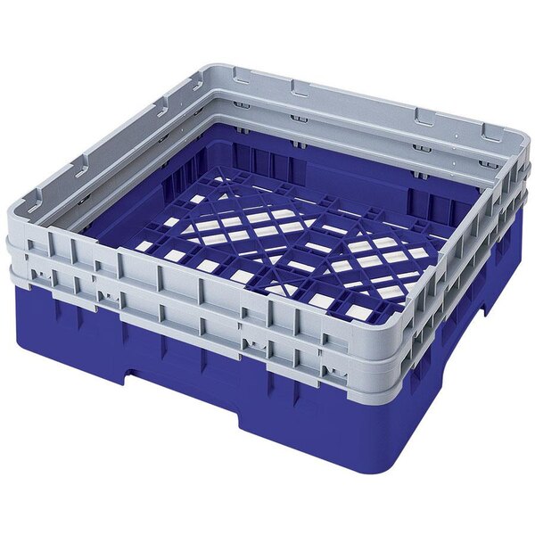 A blue plastic Cambro dish rack with closed sides and 2 extenders.