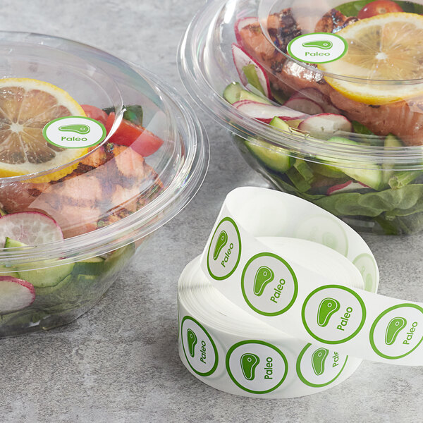 A roll of Point Plus Paleo green and white food labeling stickers.