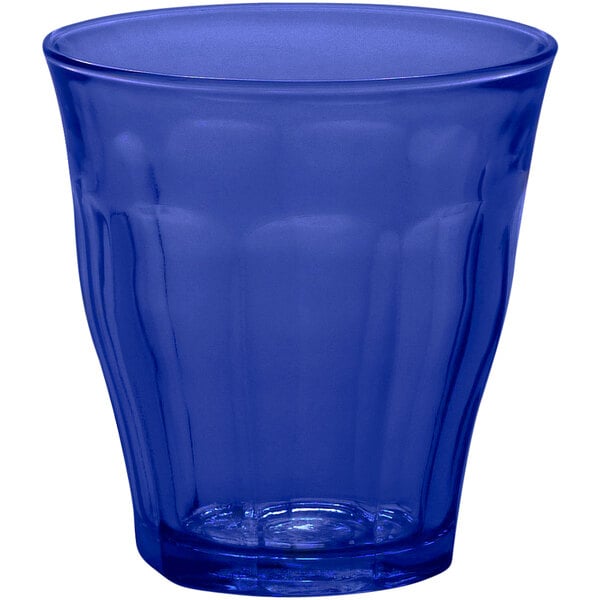 A stackable blue Duralex Picardie glass on a white background.
