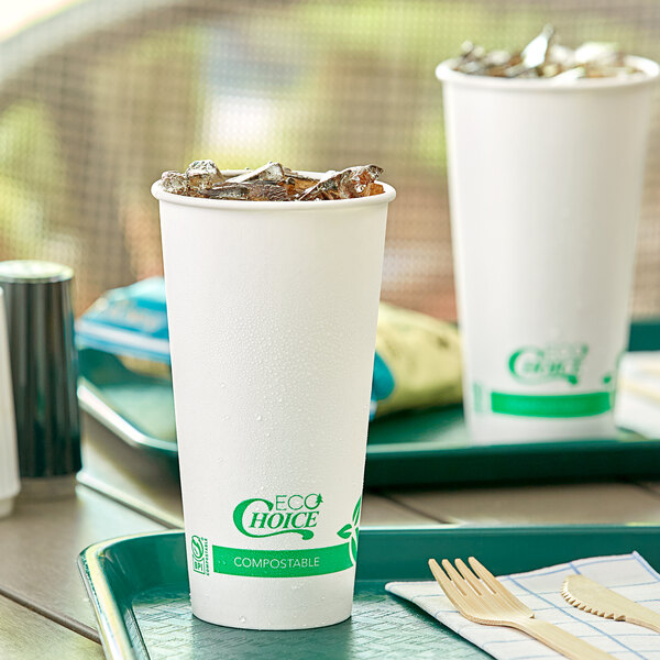 A close up of two EcoChoice Compostable PLA paper cold cups with ice.