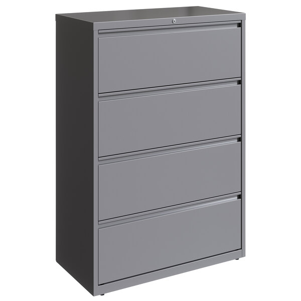 A gray Hirsh Industries steel filing cabinet with four drawers.