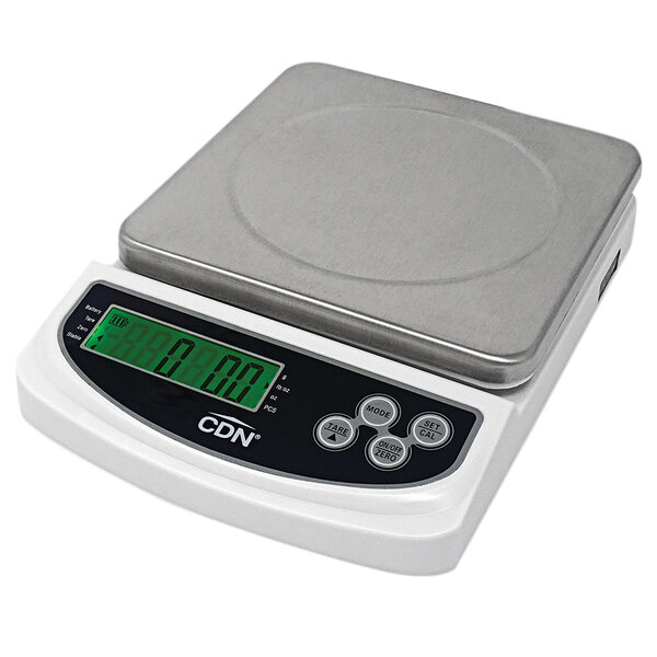 A CDN SD2206 digital portion scale with a green display on a counter.