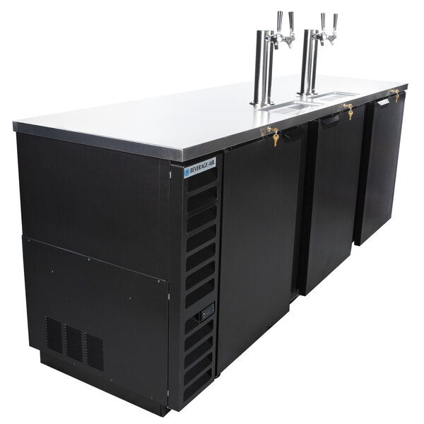 A black Beverage-Air beer dispenser with two taps on a bar counter.