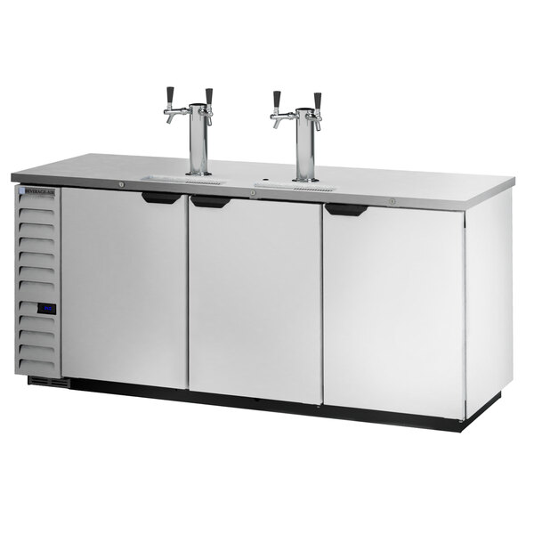 A stainless steel Beverage-Air kegerator with two taps on a white counter.