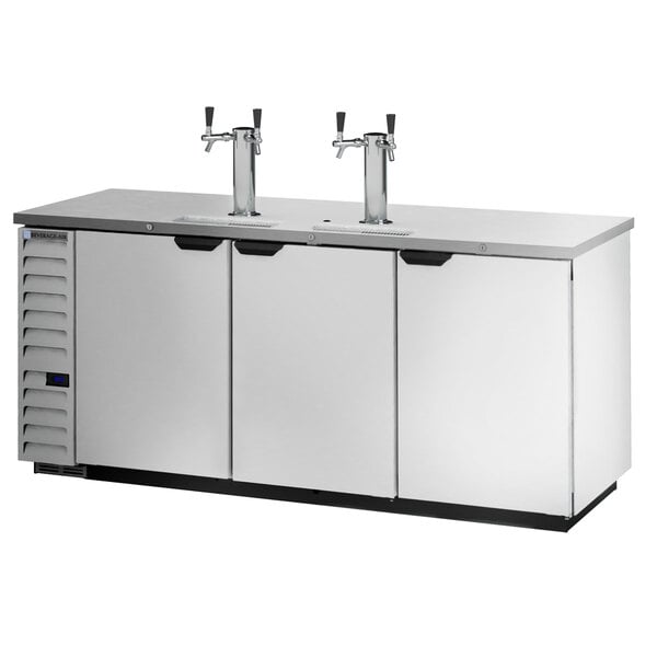 A stainless steel Beverage-Air kegerator on a white counter with two taps.