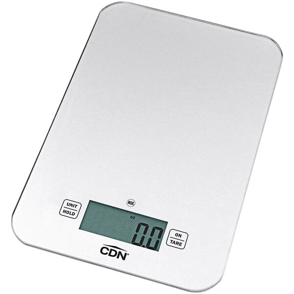 A silver CDN digital kitchen scale with a display.