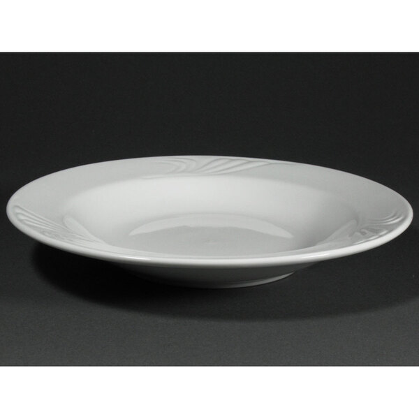 A white CAC porcelain soup bowl with a rim.