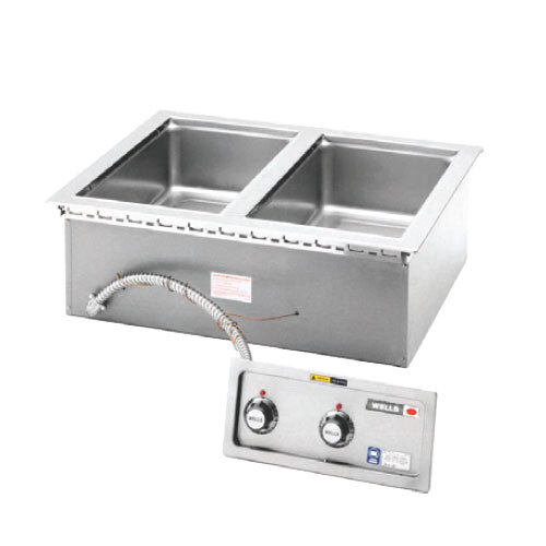 A Wells stainless steel drop-in hot food well with thermostatic controls and a drain manifold.