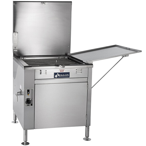 A stainless steel Avalon Manufacturing electric flat bottom donut fryer with a lid open on a counter.