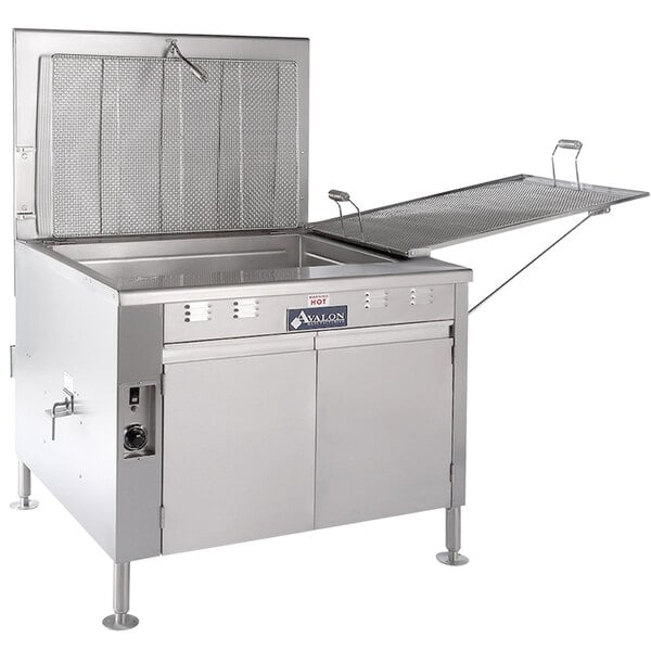 A large stainless steel commercial deep fryer with a lid.