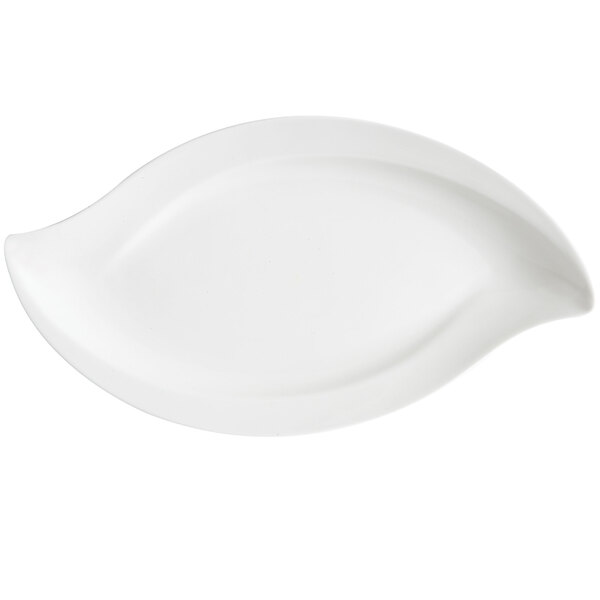 A white oval melamine platter with a leaf design on it.