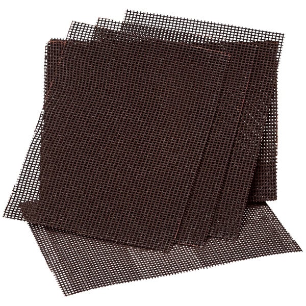 A stack of brown Scrubble by ACS black grill screens.