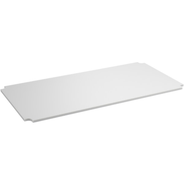 A white rectangular cutting board insert.