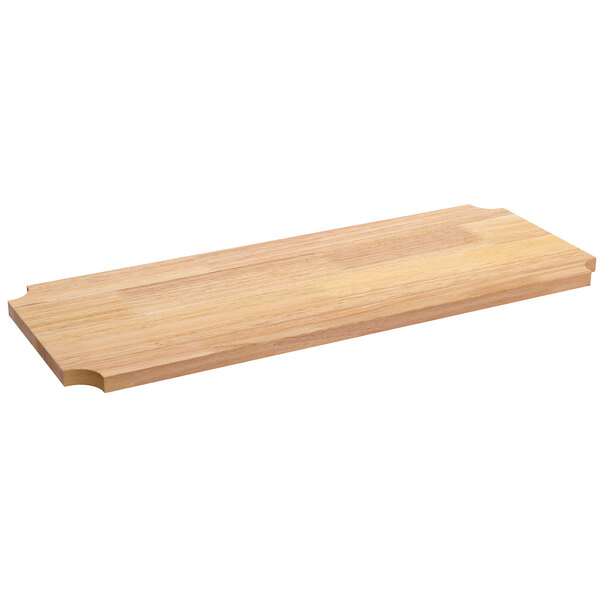 A Regency hardwood cutting board insert with a curved edge.