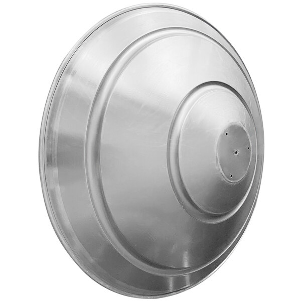 A round silver metal heat reflector with a circular center.