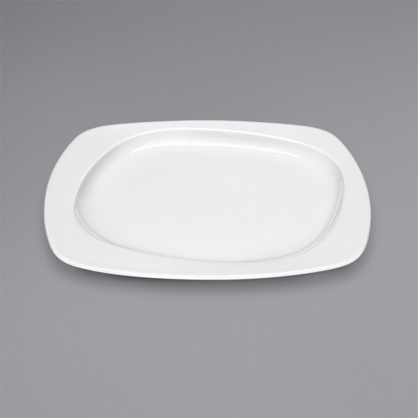 A Bauscher bright white porcelain square plate with a wide rim.