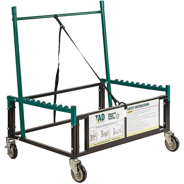 A green and black metal National Public Seating table dolly with a green handle.