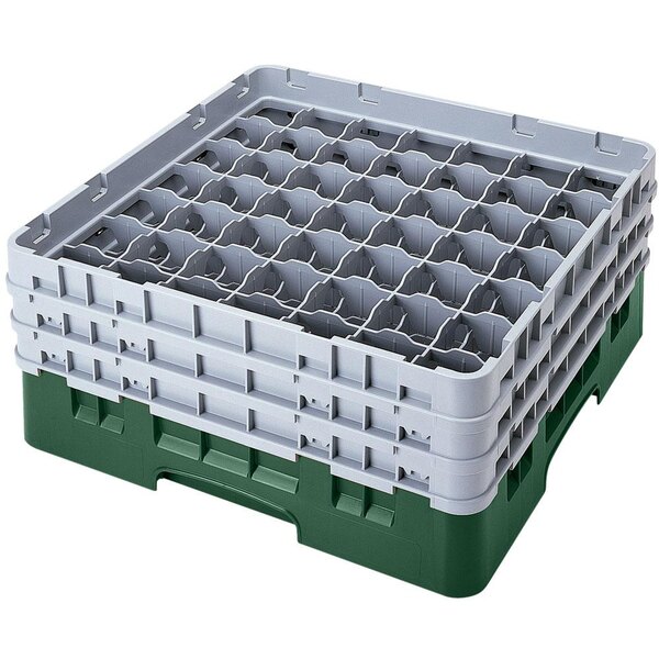 A white plastic Cambro glass rack with six green compartments.