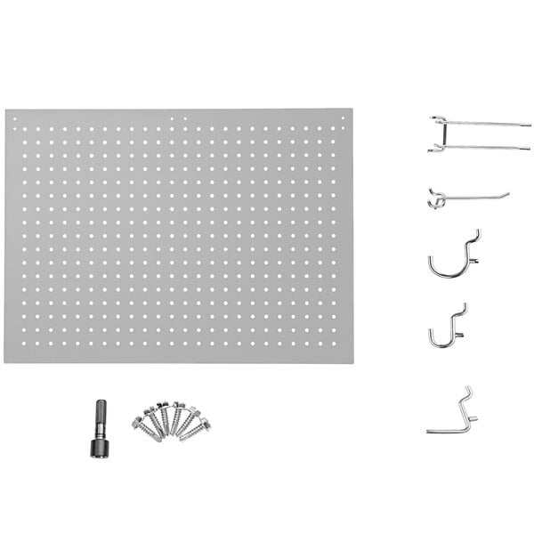 A grey National Public Seating peg board with many hooks and accessories.