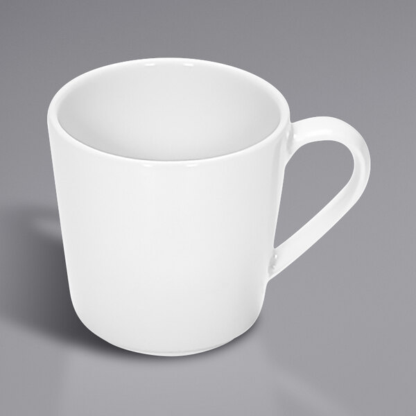 A Bauscher bright white tall mug with a handle.