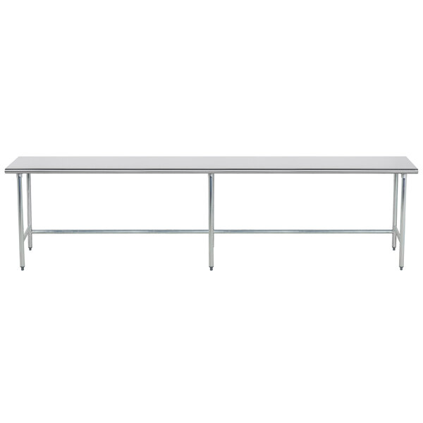 An Advance Tabco stainless steel work table with an open base and metal legs.
