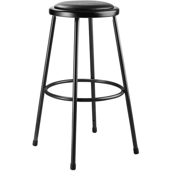 A National Public Seating black lab stool with a round padded seat.
