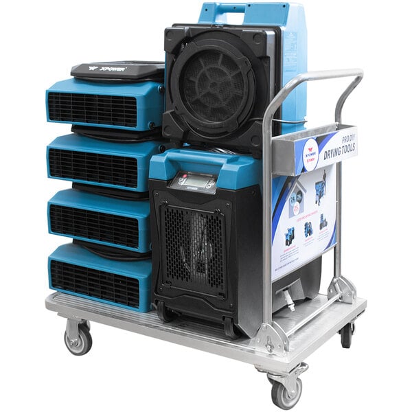 A cart with several blue and black XPOWER air blowers and a black and blue machine.