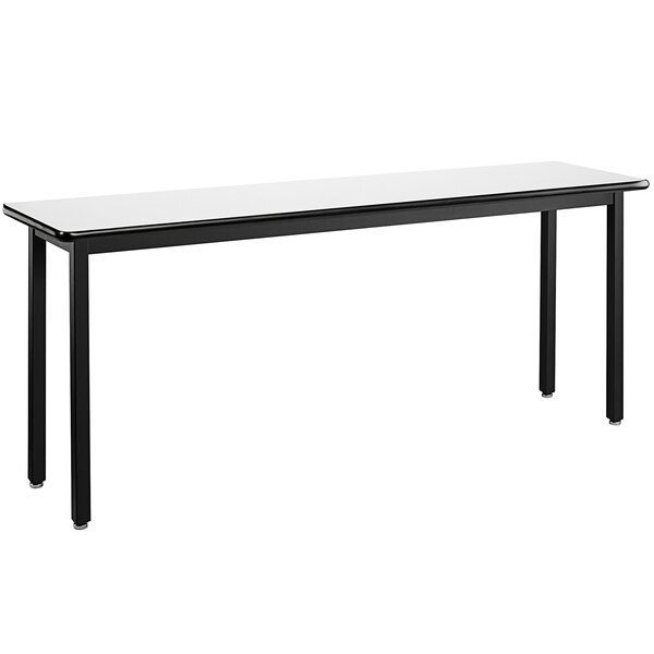 A long black National Public Seating utility table with a whiteboard top.