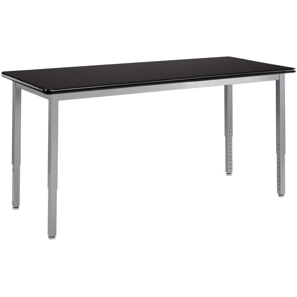A black rectangular National Public Seating utility table with silver legs.