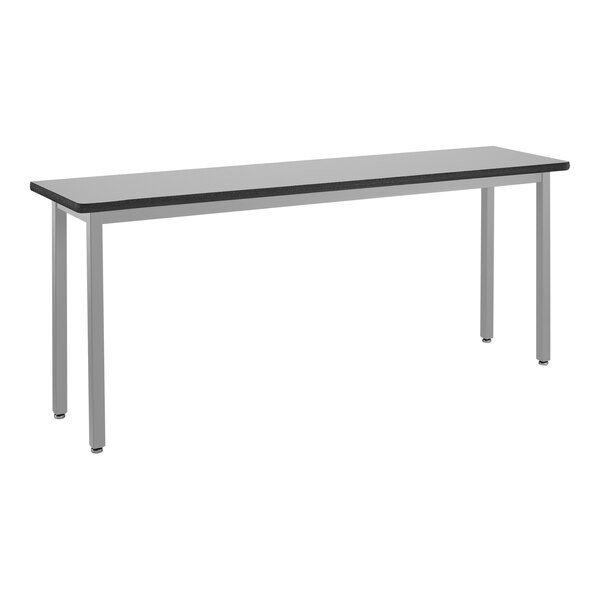 A long rectangular National Public Seating utility table with a gray metal frame and black top.