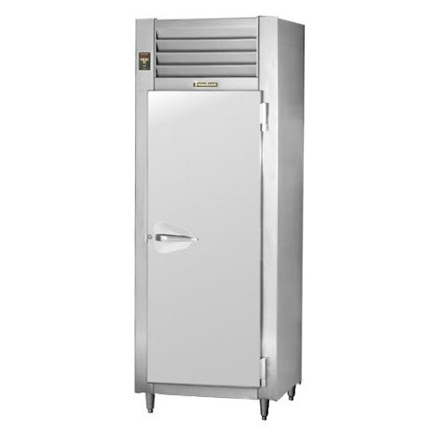 A Traulsen stainless steel reach-in freezer with a white door open.