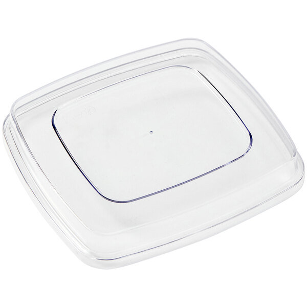 A clear rectangular lid with a small square on top.