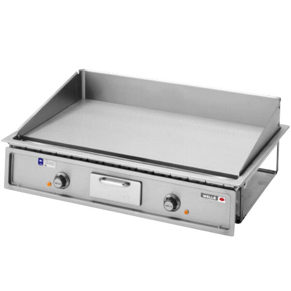 A Wells countertop electric griddle with two plates on top.