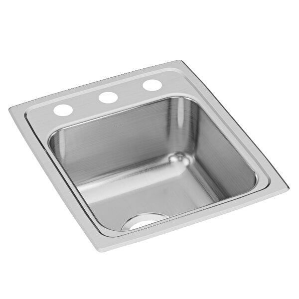 An Elkay stainless steel sink with three faucet holes.