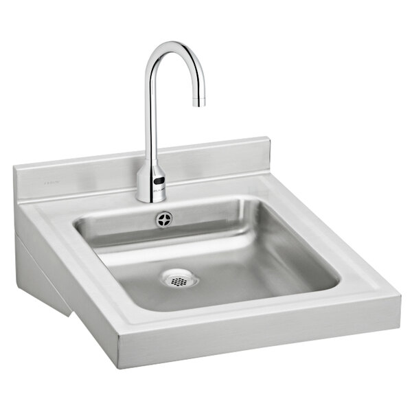 A stainless steel Elkay wall hung sink with a faucet.
