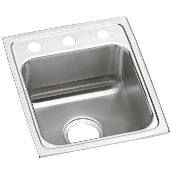 A stainless steel Elkay sink with three faucet holes.
