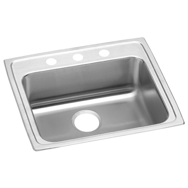 A stainless steel Elkay sink with three faucet holes on a counter.