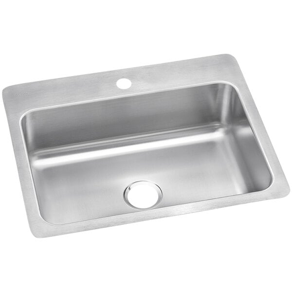 An Elkay stainless steel sink bowl with one faucet hole on a counter.