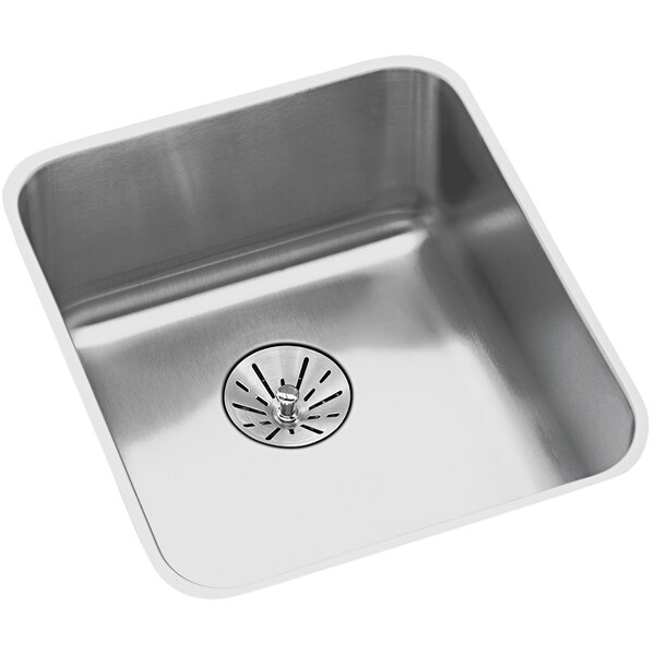 An Elkay stainless steel sink with a drain.