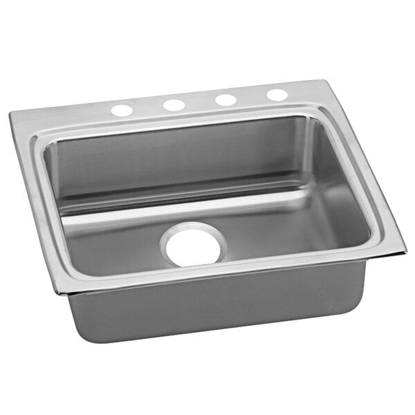 A stainless steel Elkay drop-in sink with three faucet holes.