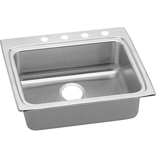 An Elkay stainless steel drop-in sink with three faucet holes on a counter.