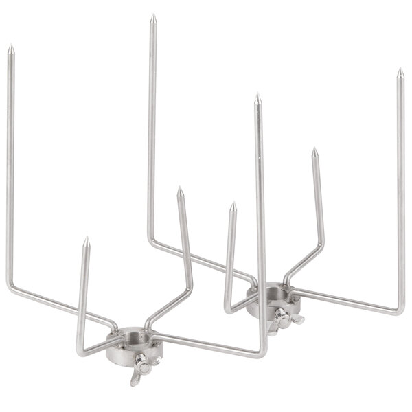 Two metal skewers with metal spikes on the ends, used for rotisserie assemblies.
