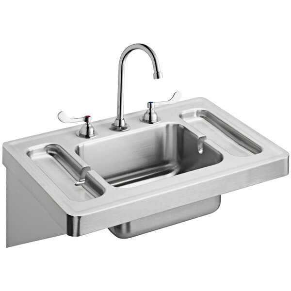 A stainless steel Elkay wall hung sink with a faucet.