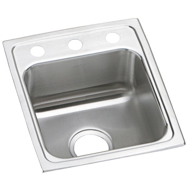 An Elkay stainless steel sink with three faucet holes.