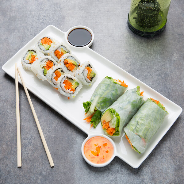 An American Metalcraft porcelain tray with sushi rolls and dipping sauce.