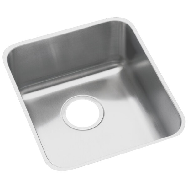A white Elkay undermount sink with a stainless steel bowl.