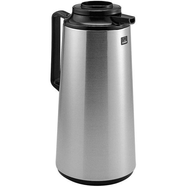 A Zojirushi stainless steel coffee carafe with a black lid.