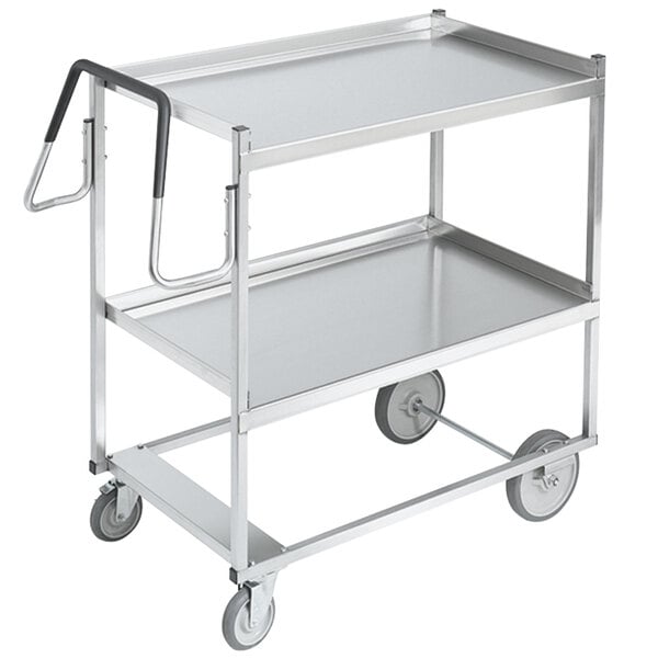 A Vollrath stainless steel utility cart with two shelves and a handle.